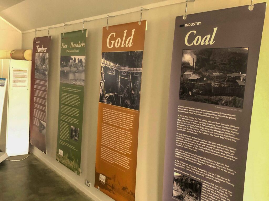 Display panels on timber, flax, gold, and coal industries at the Aorere Centre, Collingwood, Golden Bay, New Zealand.